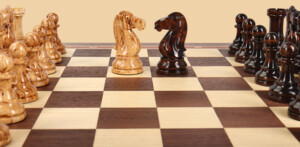 Шахматы в ларце Север (орех-ясень, клетка 4,5 см)