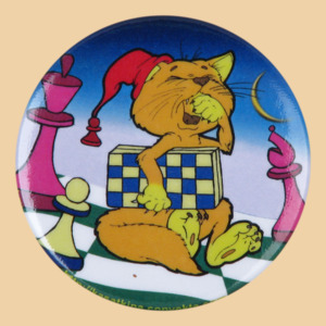 Шахматный значок Кот